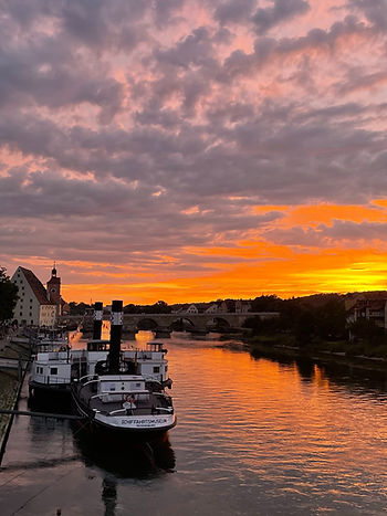 Image 1: a beautiful sunset over the Danube